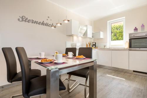 Kuchyň nebo kuchyňský kout v ubytování Residenz Seeterrassen Appartment Nr. 1