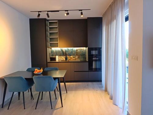 Kuchyň nebo kuchyňský kout v ubytování Bijelić Luxury Apartment with Jacuzzi