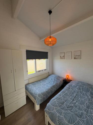 Ένα ή περισσότερα κρεβάτια σε δωμάτιο στο Buenaventura