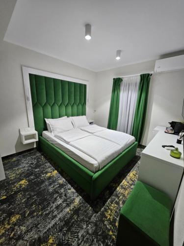 Postel nebo postele na pokoji v ubytování Pensiunea ART