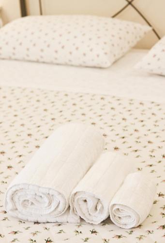 Katil atau katil-katil dalam bilik di B&B Maria Chiara