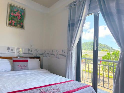 Postel nebo postele na pokoji v ubytování KHÁCH SẠN HƯNG THỊNH - Lý Sơn