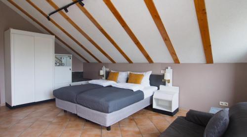 Ένα ή περισσότερα κρεβάτια σε δωμάτιο στο Stay Smart Giessen Hotel und Appartments