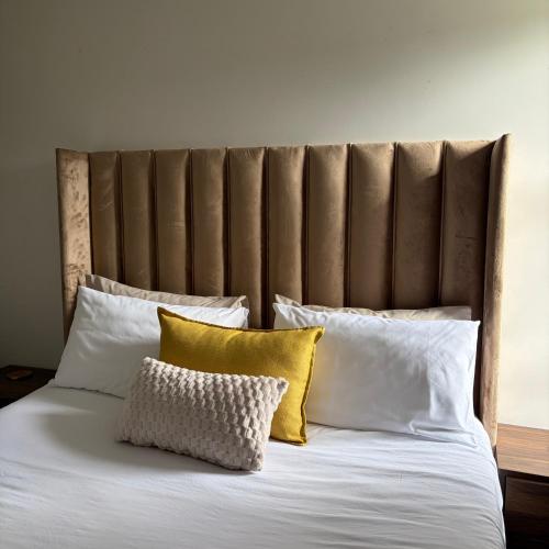 Ένα ή περισσότερα κρεβάτια σε δωμάτιο στο Casa Vita Umhlanga