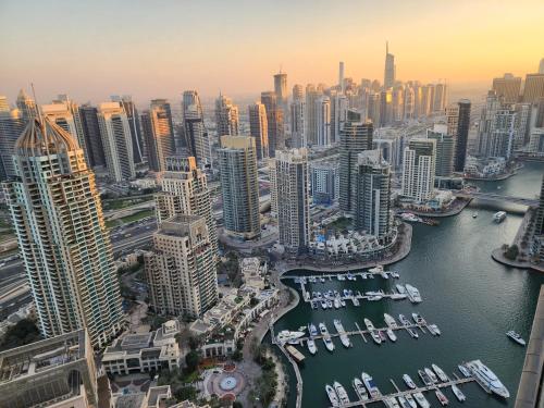 an aerial view of a city with a harbor at SOLARTE Luxe - Marina Gate - Spectacular Pools with Marina Views in Dubai