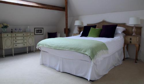 Ένα ή περισσότερα κρεβάτια σε δωμάτιο στο Hotel Restaurant Le Lion Verd