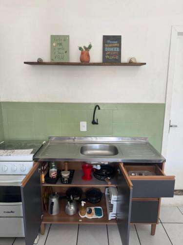 Η κουζίνα ή μικρή κουζίνα στο Loft Zona Sul próximo ao mar