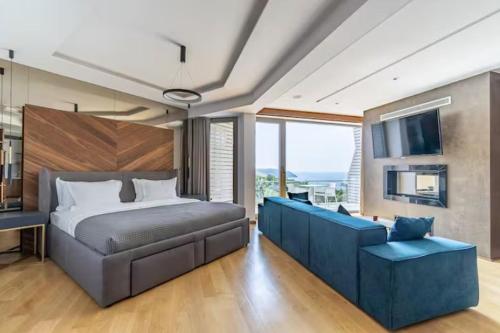 Un pat sau paturi într-o cameră la Luxury Apartments & Villas