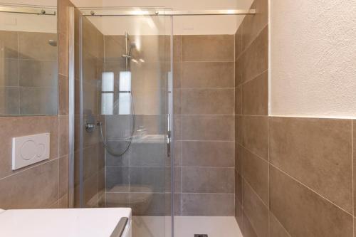 Et badeværelse på Cosy Garden Apartment In Como