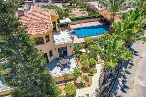 an aerial view of a house with a swimming pool at Villa Dunya in Kyrenia