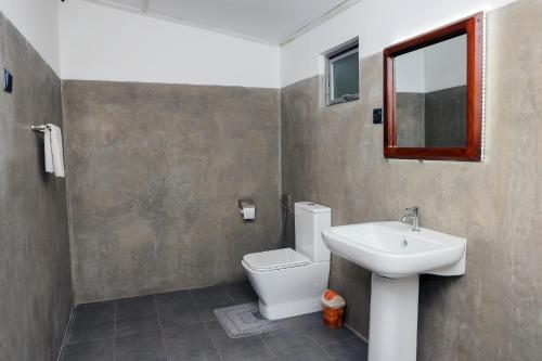 Koupelna v ubytování Elephant Trail Homestay