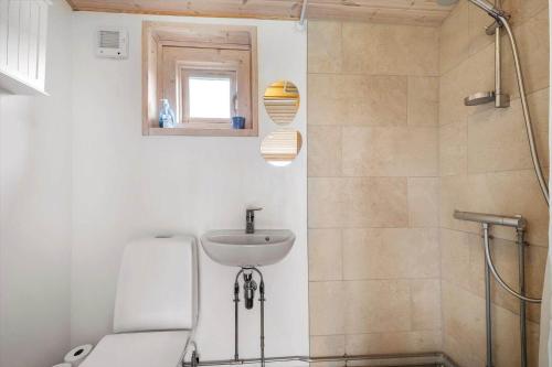 a bathroom with a sink and a shower at 20158-Samso-Laerkevej-13 in Mårup