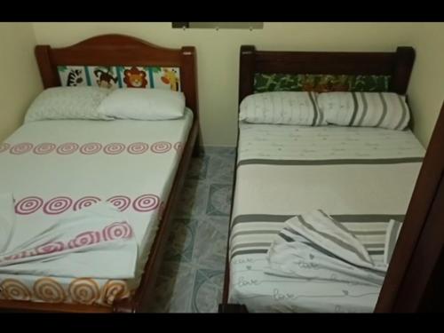 Postel nebo postele na pokoji v ubytování Casa en Doradal - Antioquia