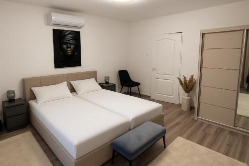 Ένα ή περισσότερα κρεβάτια σε δωμάτιο στο Nyx villa