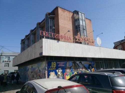 a building with a sign on top of it at Arena Irkutsk in Irkutsk