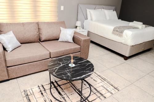 Et opholdsområde på Grace View Guest House - Fourways