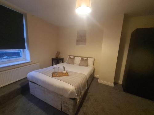 Postel nebo postele na pokoji v ubytování North Shields Exec Apartments
