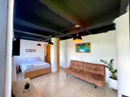 Ένα ή περισσότερα κρεβάτια σε δωμάτιο στο MINI-SUiTE CONFORT