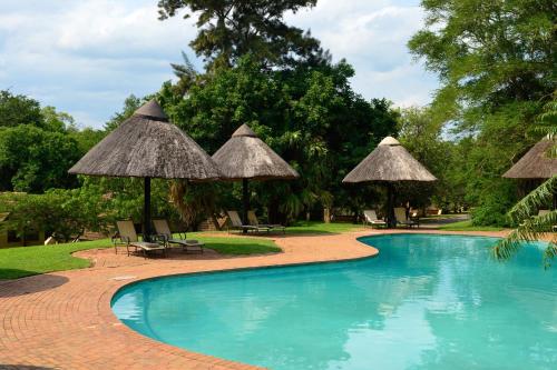 Πισίνα στο ή κοντά στο Pestana Kruger Lodge
