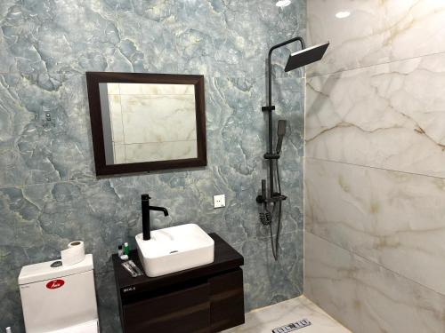 Koupelna v ubytování Olive Seaside Hotel