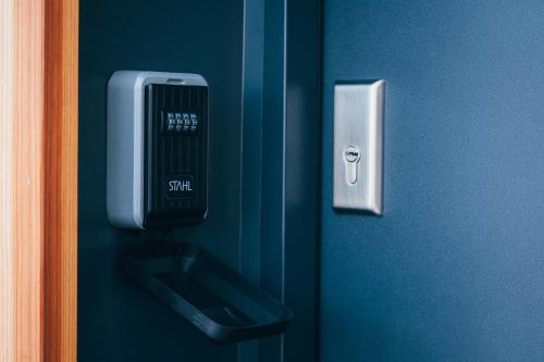 a close up of a door with a safe on it at Rokle Tiny house Plandry in Plandry