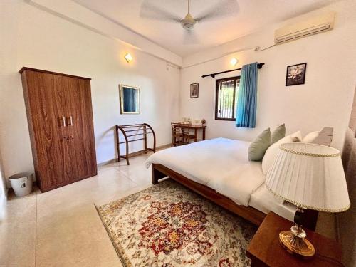 Ένα ή περισσότερα κρεβάτια σε δωμάτιο στο Nest Villas