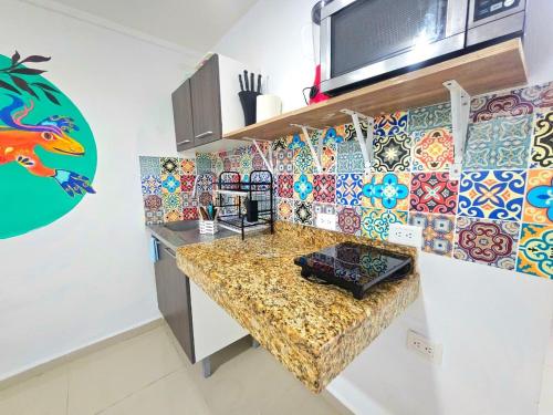 Кухня или мини-кухня в Villa Leo
