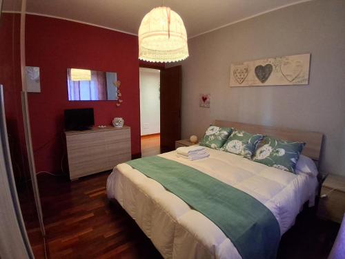 Ένα ή περισσότερα κρεβάτια σε δωμάτιο στο LA CASA Di ALE