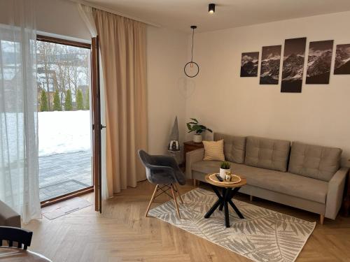Et opholdsområde på Apartament Kryształowy Potok