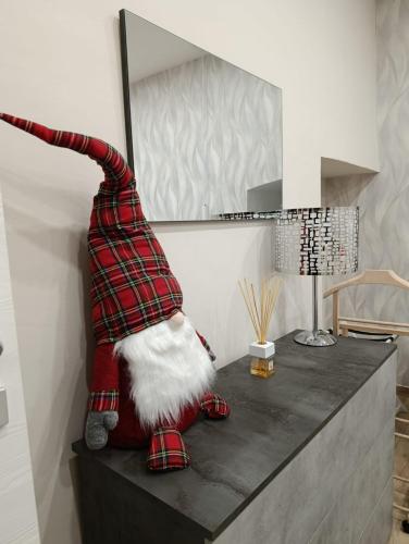 a statue of a santa claus standing on a counter at Porta Napoli Holidays in Sulmona