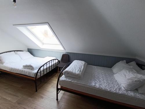 Giường trong phòng chung tại Stella Di Mare