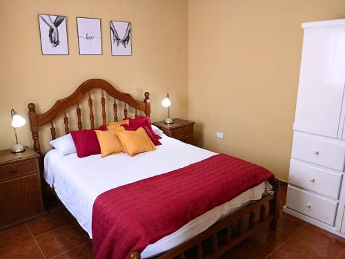 En eller flere senge i et værelse på Depto PAR