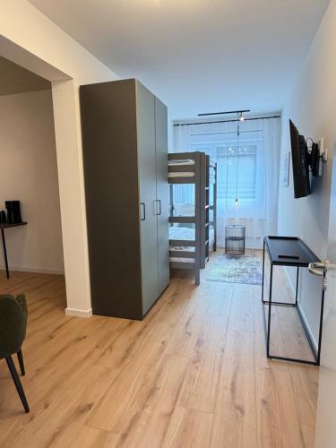 TV a/nebo společenská místnost v ubytování Business & fitter Apartment Schwabach