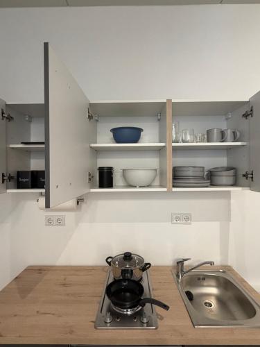 Kuchyň nebo kuchyňský kout v ubytování Business & fitter Apartment Schwabach