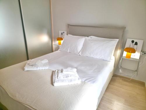 Ένα ή περισσότερα κρεβάτια σε δωμάτιο στο F15teen Urban Living