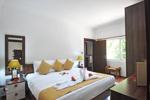 Cama o camas de una habitación en Yasad Residence
