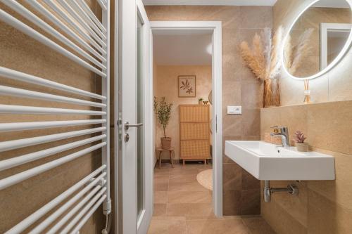 Koupelna v ubytování Pronájem útulného a vybaveného bytu