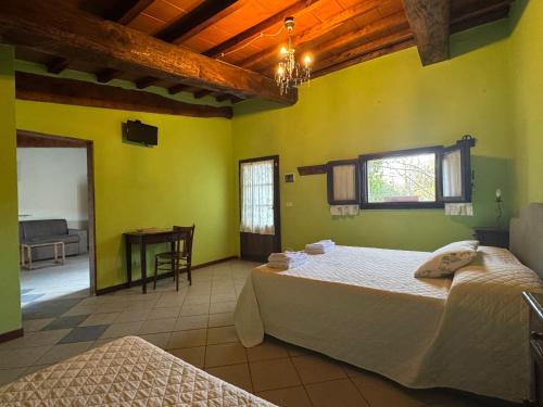 Кровать или кровати в номере Agriturismo la Gioia