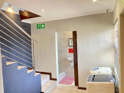 Ένα ή περισσότερα κρεβάτια σε δωμάτιο στο Unit 2, GatherPoint Sleeps 8 Self-Catering Group Belhar-CT