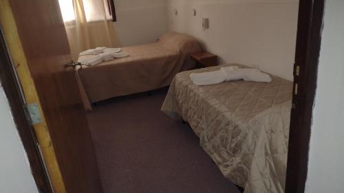 Ένα ή περισσότερα κρεβάτια σε δωμάτιο στο Suteryh