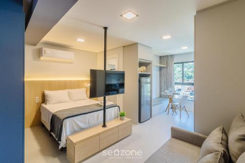 Postel nebo postele na pokoji v ubytování Estúdios Modernos e Completos em Blumenau - ELN