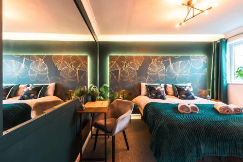 Ένα ή περισσότερα κρεβάτια σε δωμάτιο στο Free Parking 11 Guests Family&Contractors Bedford