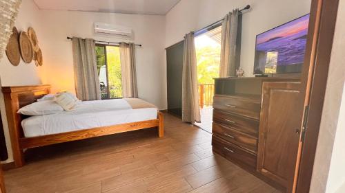 Ένα ή περισσότερα κρεβάτια σε δωμάτιο στο Mar Adentro San Blas