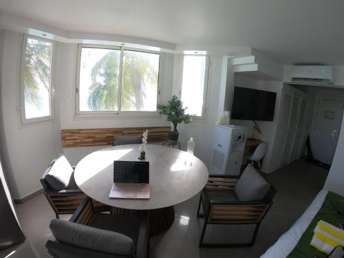 TV a/nebo společenská místnost v ubytování Guadeloupe Ilet Gosier best view