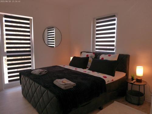 Ένα ή περισσότερα κρεβάτια σε δωμάτιο στο Neu gebaut - Modern - Apartments - Boardinghouse Weiße Taube