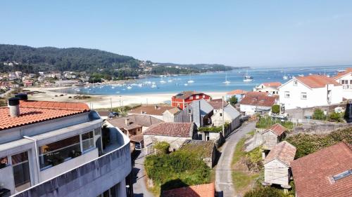 Φωτογραφία από το άλμπουμ του Apartamento en Aldán , Playa a 2 min , Vistas a la montaña σε Aldan