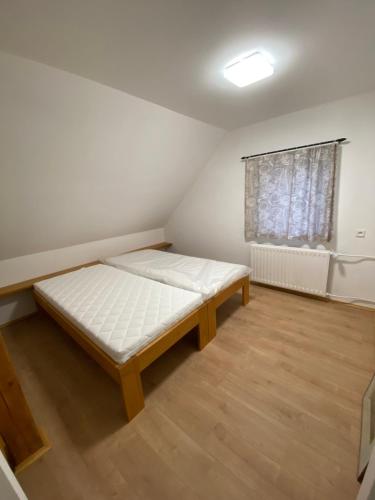 Postel nebo postele na pokoji v ubytování Pohodárium