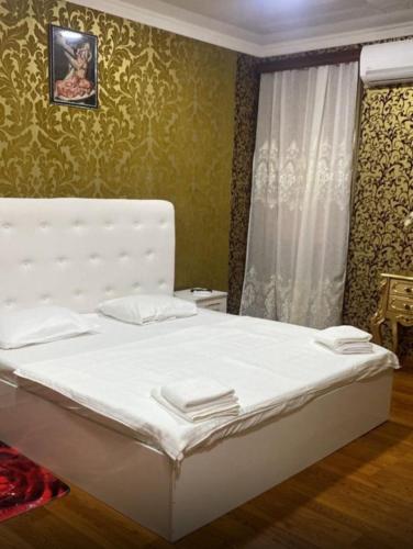 Postel nebo postele na pokoji v ubytování Giorgia hotel