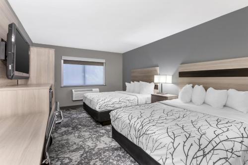Ένα ή περισσότερα κρεβάτια σε δωμάτιο στο Best Western Blythe