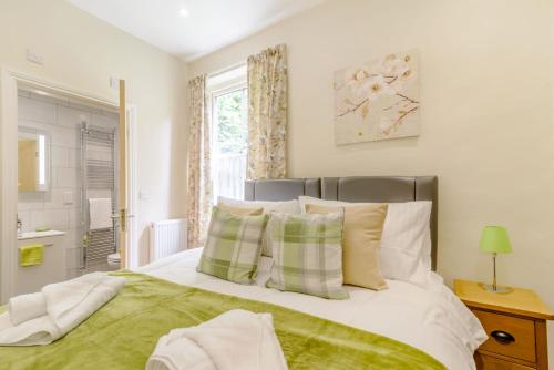 Ένα ή περισσότερα κρεβάτια σε δωμάτιο στο Cote Ghyll Mill Bed & Breakfast at Osmotherley